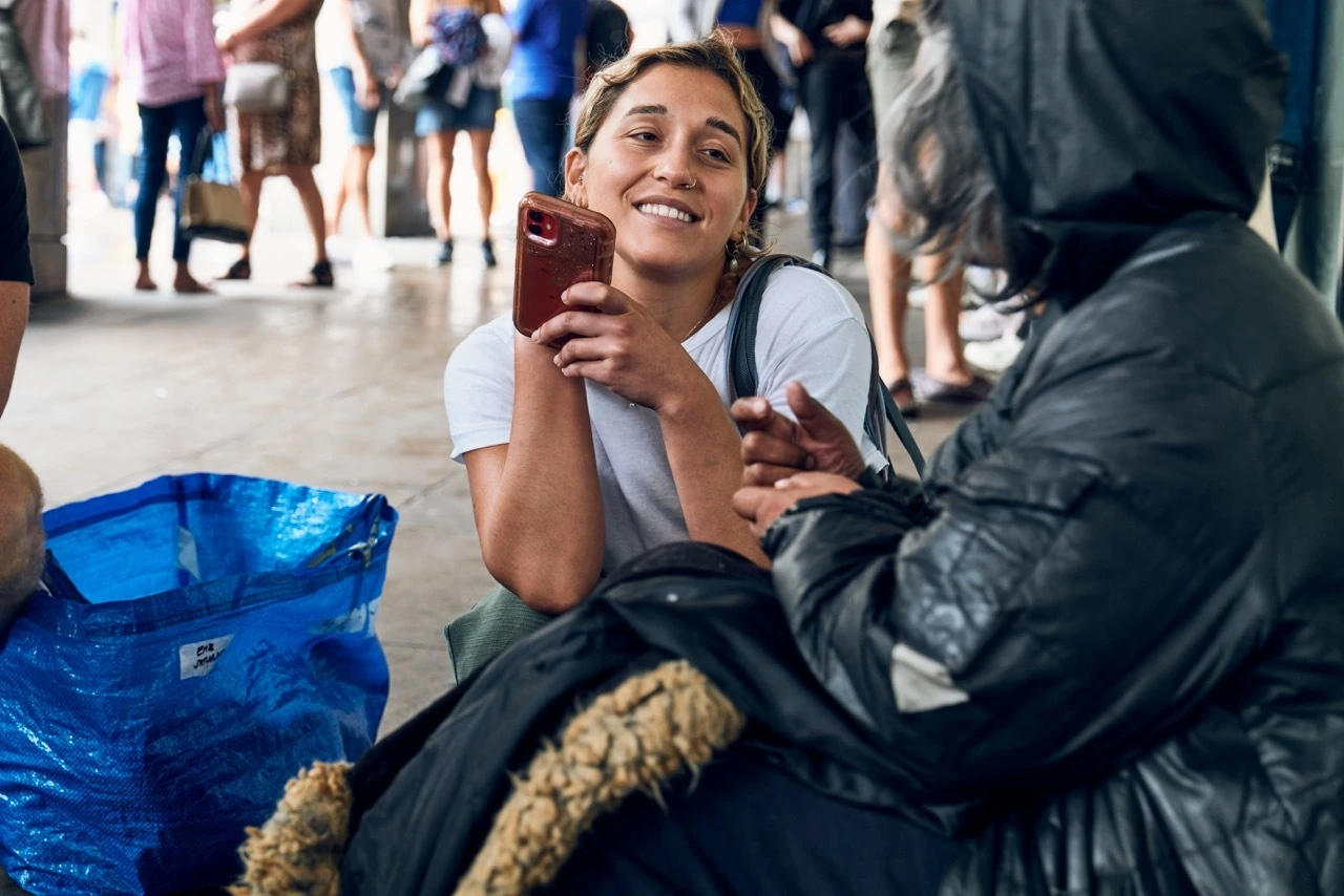 A street-level conversation in Under One Sky’s community work